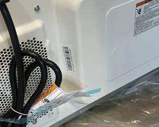 New - modern black microwave oven - $99