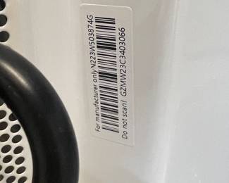 New - modern black microwave oven - $99