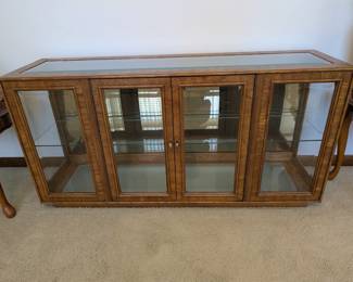Dark wood credenza, glass doors 