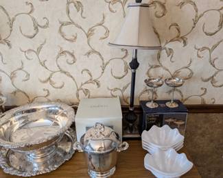 Silver plated punch bowl, ice box, and wine bottle holder. Plastic sea shell bowls, silver plated champagne glasses