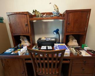 dark wood desk and chair
