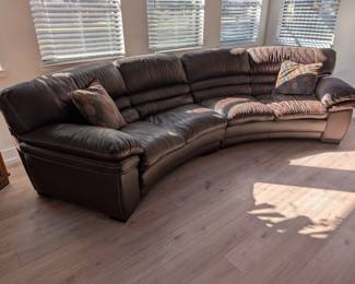 Contemporary curved leather sofa