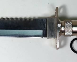 Clip Point Survival Knife With Sawback, Handle Holds Compass, Matches, Hooks, And More, 8" Blade, In Nylon Sheath