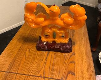 A modern resin Feng Shui sculpture of an elephant with Ruyi symbol. estimate this decorative sculpture to be valued between $30-$70 USD. Sale price, $25