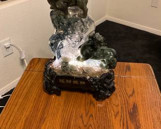 Illuminated carved quartz sculpture of Qilin with auspicious symbols. estimate this carved quartz Qilin sculpture to be valued between $500-$1,500 USD, depending on its size, quality of carving, and the specific type of quartz used. Sale price $200