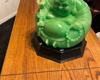 Artificial jade laughing Buddha figurine with prayer beads and ruyi scepter. estimate this artificial jade Laughing Buddha figurine to be valued between $50-$150 USD. Sale price $50