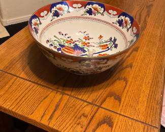 A large Chinese export porcelain famille rose floral bowl. estimate this Chinese export porcelain bowl to be valued between $300-$500 USD. Sale price $100