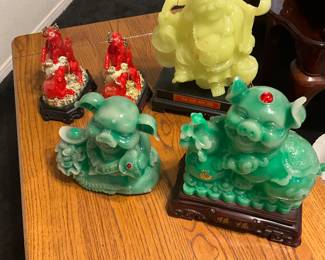 Yellow statue, A modern decorative statue of the Laughing Buddha holding a ruyi scepter. estimate this decorative Laughing Buddha statue to be valued between $50-$150 USD. Sale price for all 5 pieces, $80