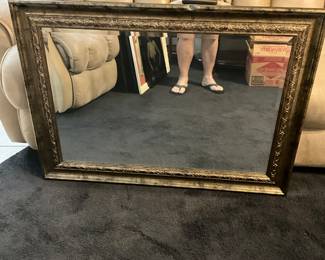 Ornate Victorian-style giltwood wall mirror with acanthus leaf carvings. this antique giltwood mirror to be valued between $250-$450 USD. Sale price $100