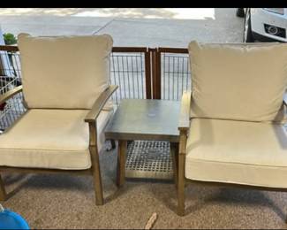 Hampton Bay patio chairs with small table. We have two sets! These are less than a year old and kept on enclosed porch. Sturdy furniture! These will not go half price.
