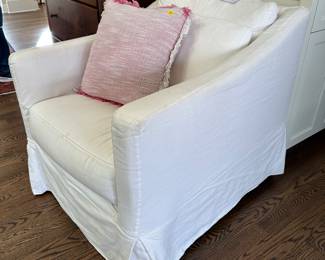White swivel slipcover chair
