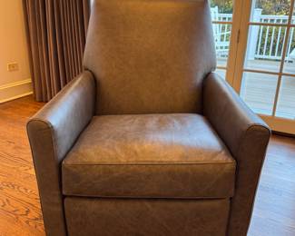Harvey Leather Swivel Recliner in Laco Grey. Measures 30" W x 36" D. Photo 1 of 4.