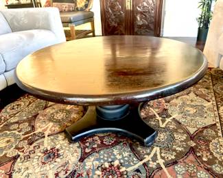 Pedestal base wood coffee table