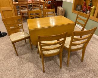 Heywood Wakefield dining table with 2 leaves and 2 drop leaves! Includes 6 chairs!