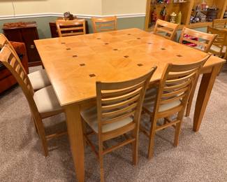 Hightop table (shown with leaf installed) and 8 chairs! (We have two of these - I'll post a pic of the other set).....