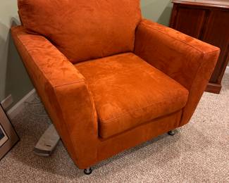 Orange upholstered armchair