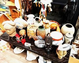 Kachina doll straight out of box. Various clay pottery and baskets.