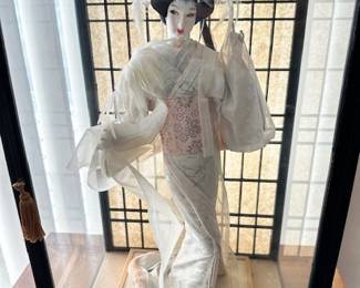 Japanese Geisha doll in glass case