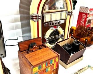 1950's Rare Japanese wooden musical cigarette dispenser & a Crosley CR-11 Collectors Ed. Lighted AM/FM Radio Cassette Jukebox