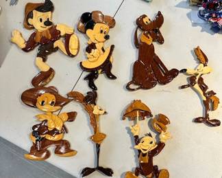 Wood carved Disney wall hangings