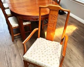 Available for Pre-Sale. Gorgeous Vintage Hand Carved Chinese Rosewood Oval Dining Set in very good condition. Table with 2 removable leaves for your convenience. The set comes with 6 side chairs and 2 armchairs. Silk has always been covered in plastic. This set can mix well with eclectic, modern or traditional design. $1900. Or Best Offer. Call Connie for more info. 619-962-1800