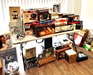 New In Box Room filled with small kitchen appliances and more.