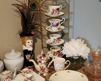 Tea anyone? Rose teacups, and teapots.