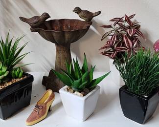 Accent plants and cast iron bird bath decor