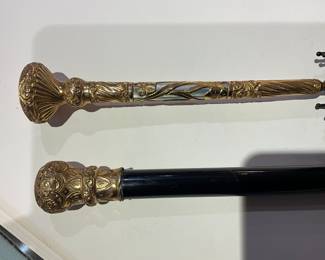 An umbrella and a cane handles