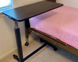 Adjustable bedside table