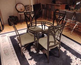 Wrought iron table and four chairs