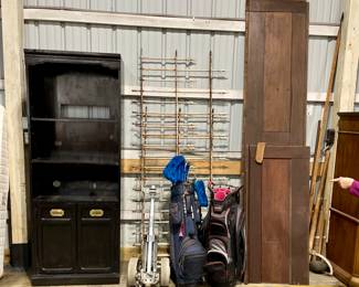 TV cabinet, golf clubs