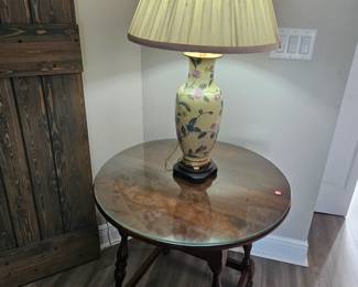 Dark wood accent table with glass protector $75.00
