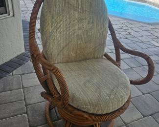Vintage Rattan swivel chair
$100