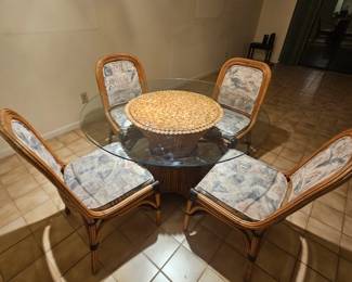 Vintage rattan kitchen table with glass top $300