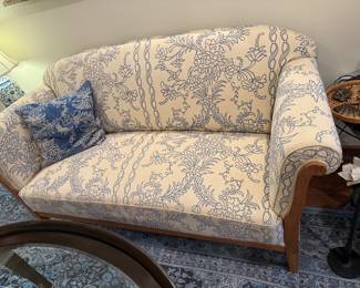 Extremely nice 1920's loveseat that was recovered in France with high end fabric. The loveseat and matching chairs are pre war era and extremely comfortable.