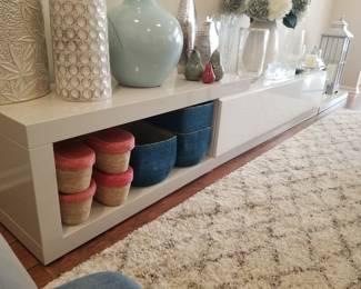 Italian entertainment credenza with open and closed storage. 