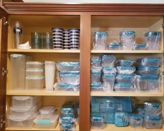 Assorted kitchen storage containers, many unused and in original packaging. 