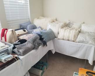 Decorative pillows, blankets, and throws. 