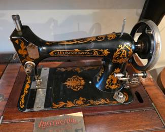 #19  Minnesota Model "A" Sewing Machine w/Cabinet  45"Wx20"Dx30"H   $325