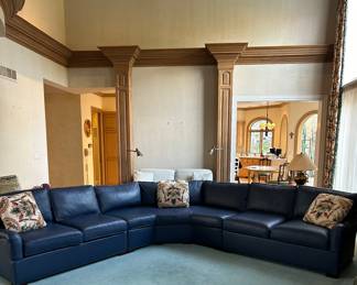 PRESALE AVAILABLE Blue Italian leather sofa sectional -  51”w center wedge and then 93”L  from corner of wedge to end on each side along back. 