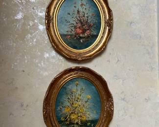 pair of oval framed oil florals