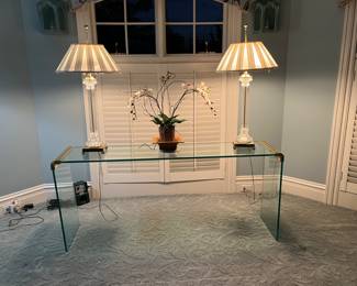 glass and brass sofa or console table- 62w x 15d x 27h and 34"h  glass column lamps 