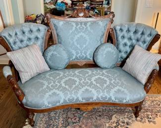 Victorian carved settee.