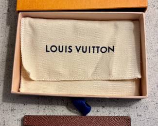 Louis Vuitton monogram credit card holder with original box and dust bag.
