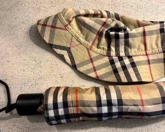 Burberry London ladies bucket hat and umbrella in classic check pattern.