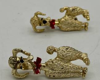 Vintage poodle brooches.
