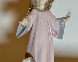 Lladro "Under My Spell" figurine.