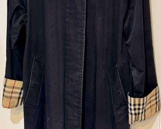 Ladies Burberry London black rain coat.