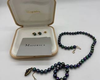 Majorica iridescent pearl necklace and matching 14K earrings.